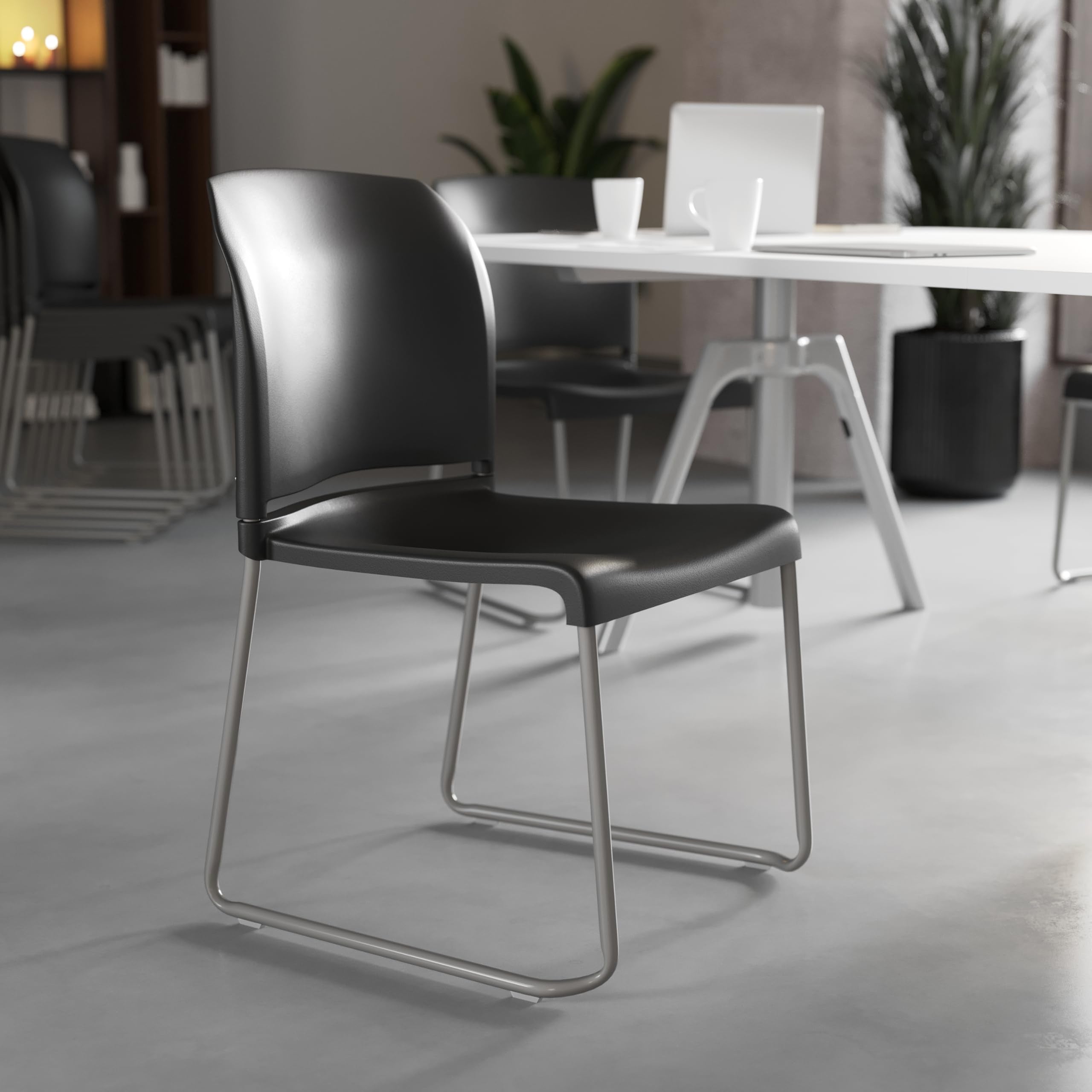 HERCULES Series 880 lb. Capacity Black Full Back Contoured Stack Chair with Gray Powder Coated Sled Base