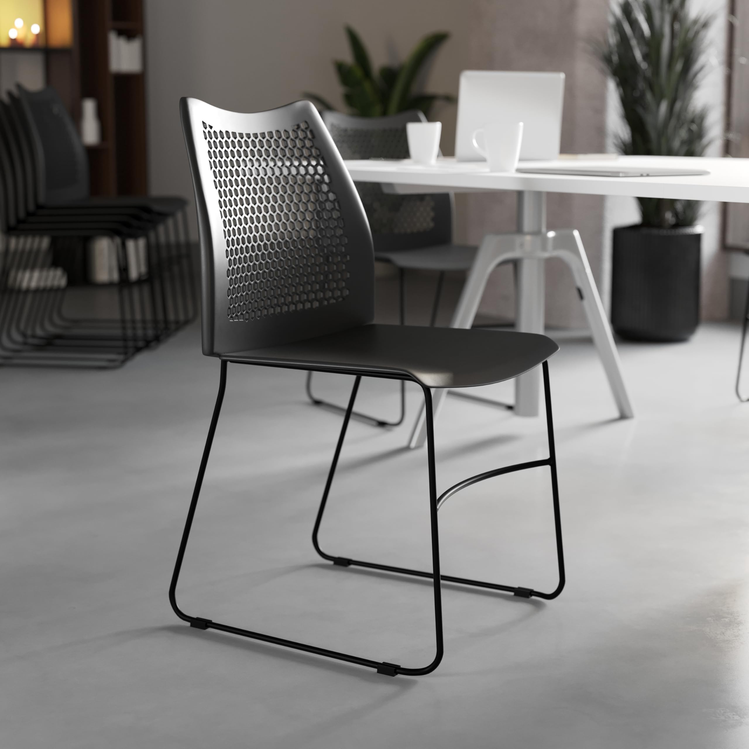 HERCULES Series 661 lb. Capacity Black Stack Chair with Air-Vent Back and Black Powder Coated Sled Base